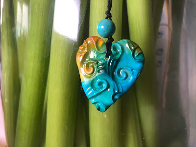 Stamped and inked air dry clay pendant